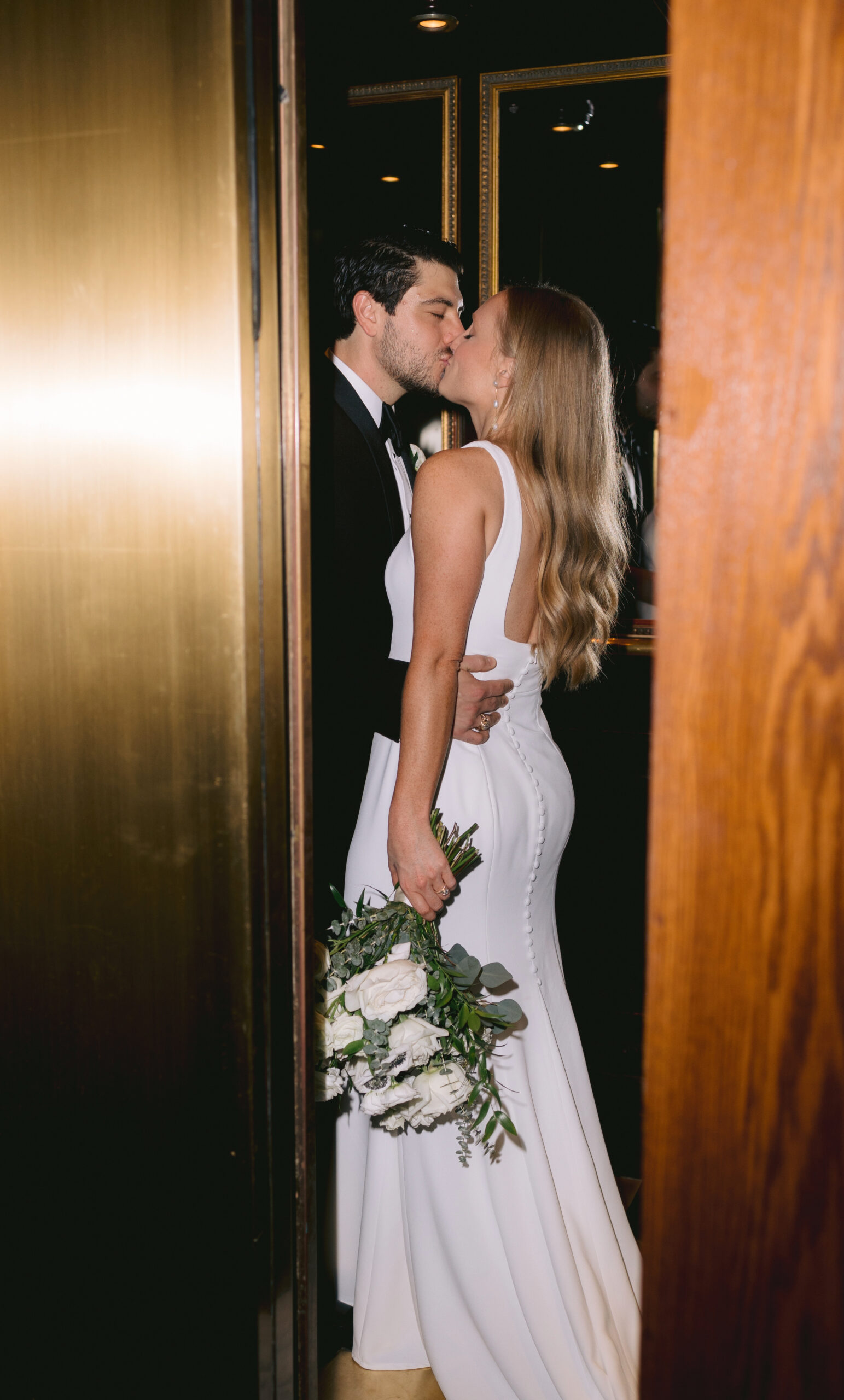 Galveston wedding couple in elevator at hotel galvez