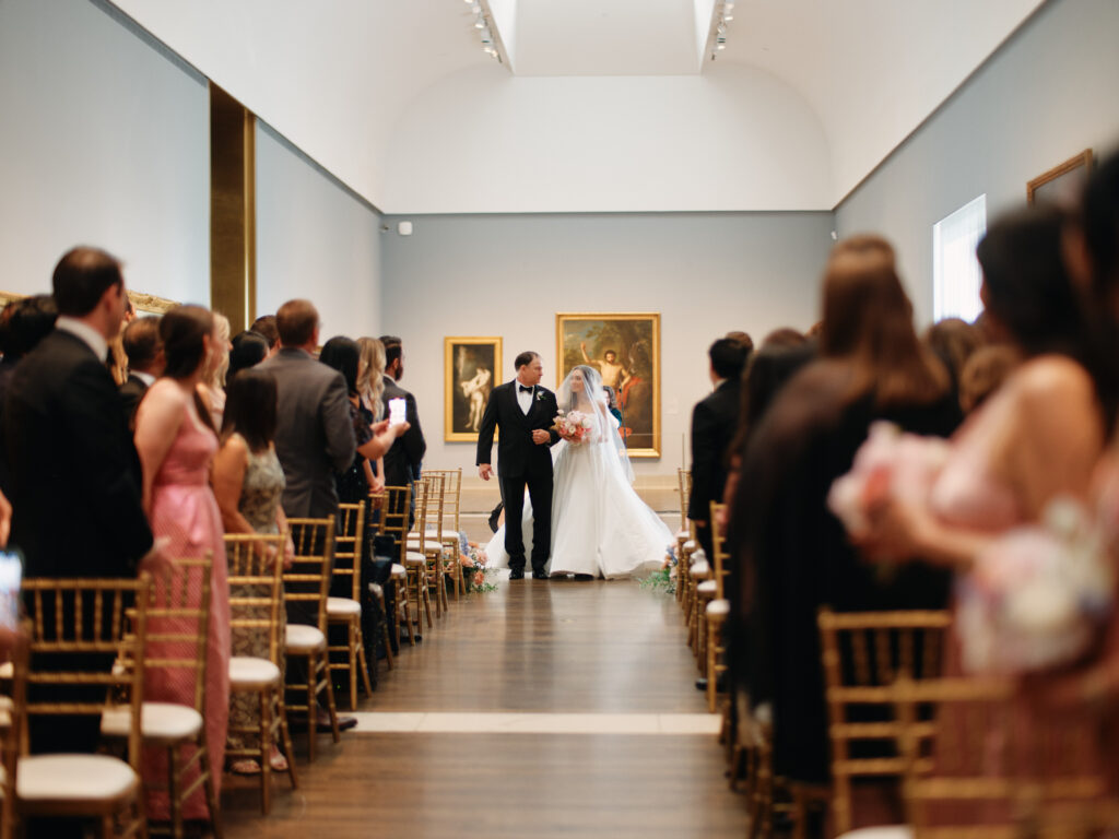 A dramatic walk down the aisle at museum of fine arts houston