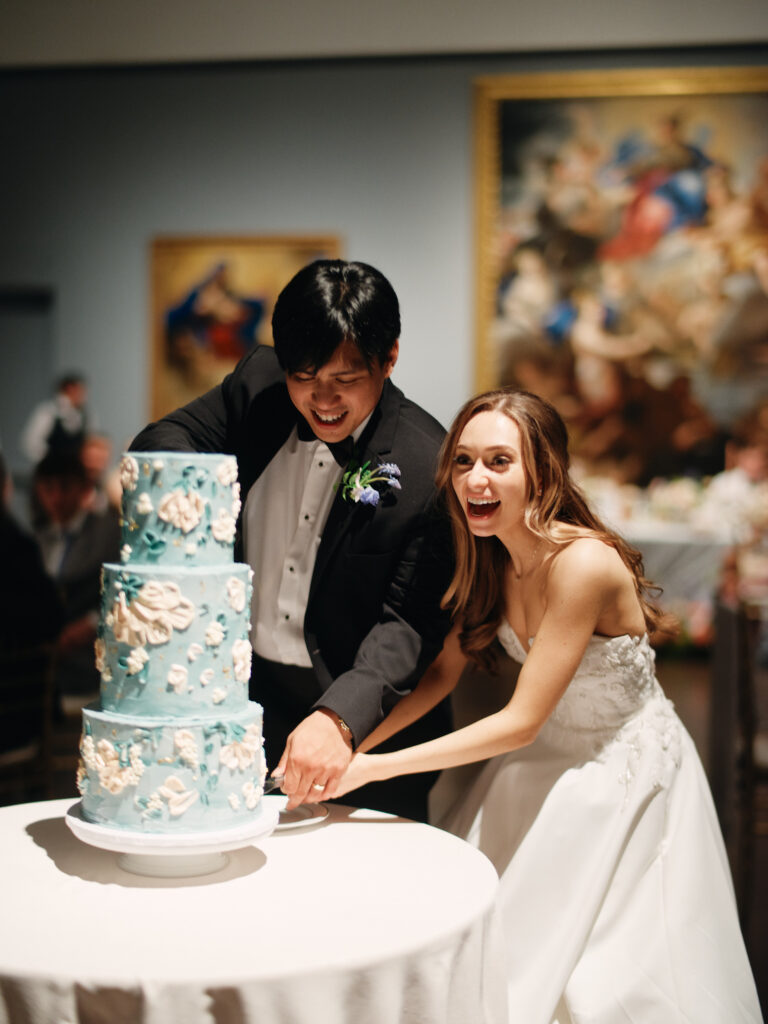 cake cutting at mfah, an art-inspired wedding cake