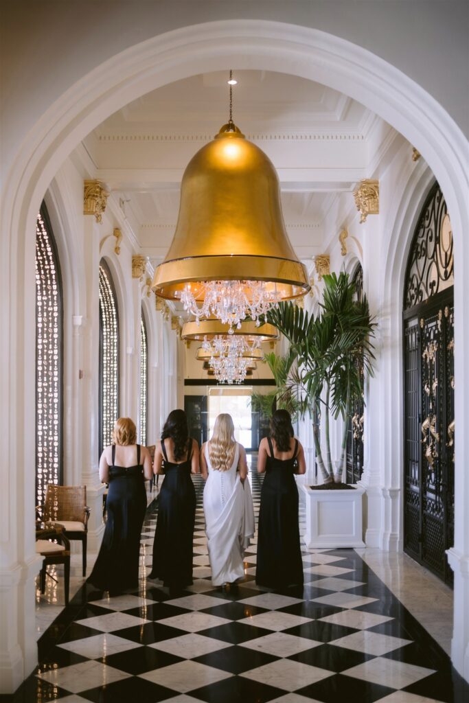 bridesmaids in the hallway at the grand galvez hotel