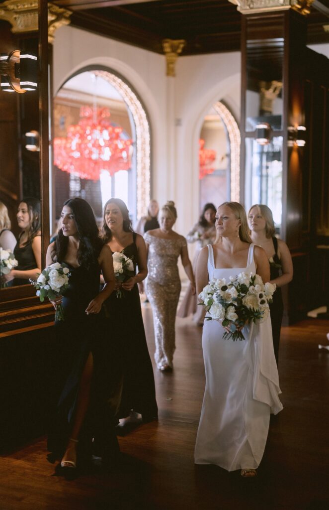 bridesmaids in the lobby at grand galvez hotel