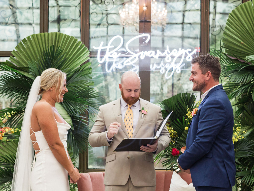 Wedding ceremony inside the bryan museum conservatory