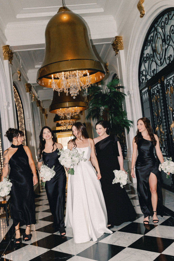 Bride with her Bridesmaids at Grand Galvez in the hall of bells