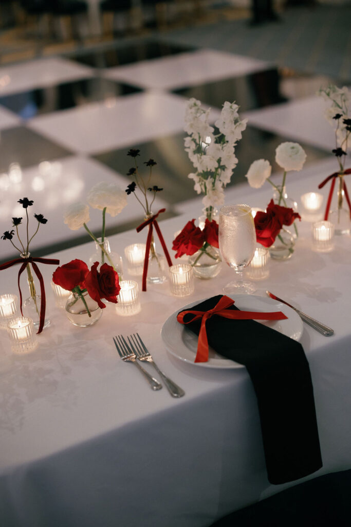 red bow on black napkin wedding table