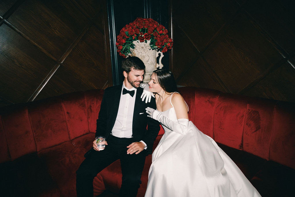 Bride and groom at the bar at hotel galvez