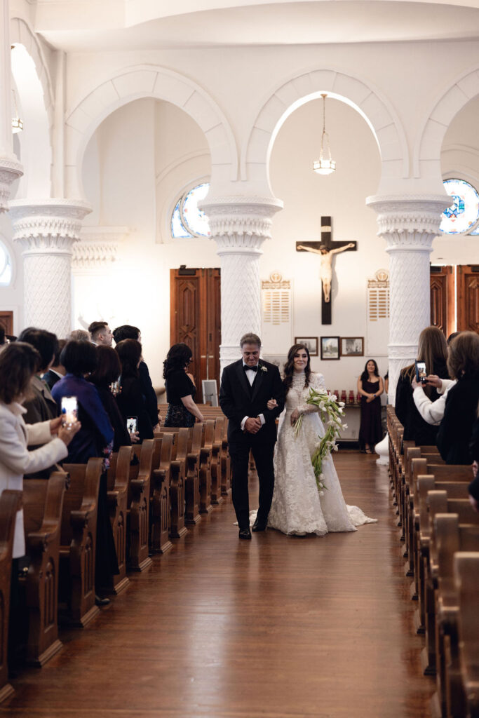 Sacred Heart Catholic Church wedding: Bride and her father moment.