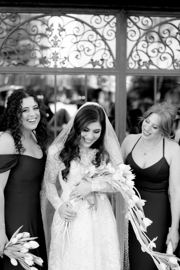 Close-up photo of the Bride with her bridesmaids, captured outside Bryan Museum Conservatory.