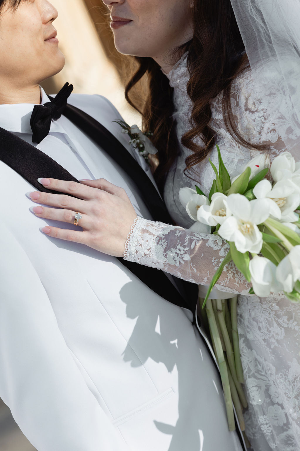 Bride and groom with cashading tulip bouquet