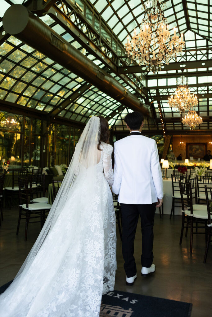 Groom and Bride enters the Bryan Museum Conservatory.