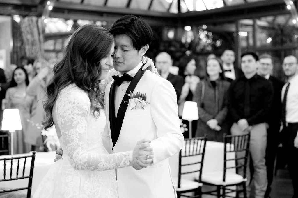Bride and groom shares their first dance at the Bryan Museum Conservatory.