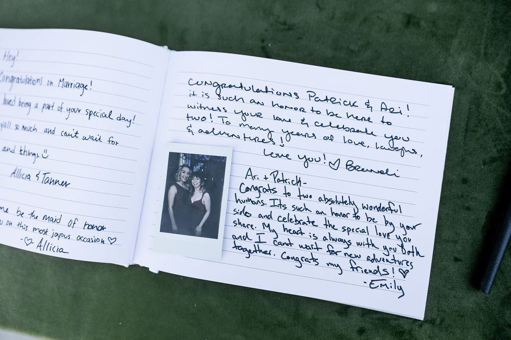 Wedding reception guestbook photo captured outside Bryan Museum Conservatory.