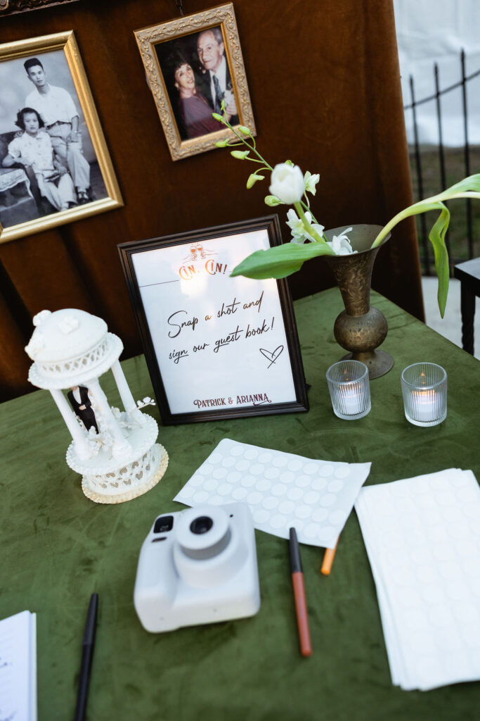 Wedding reception guestbook photo captured outside Bryan Museum Conservatory.