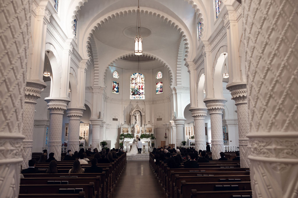 Galveston wedding Mass: Elegant ceremony at Sacred Heart Catholic Church.