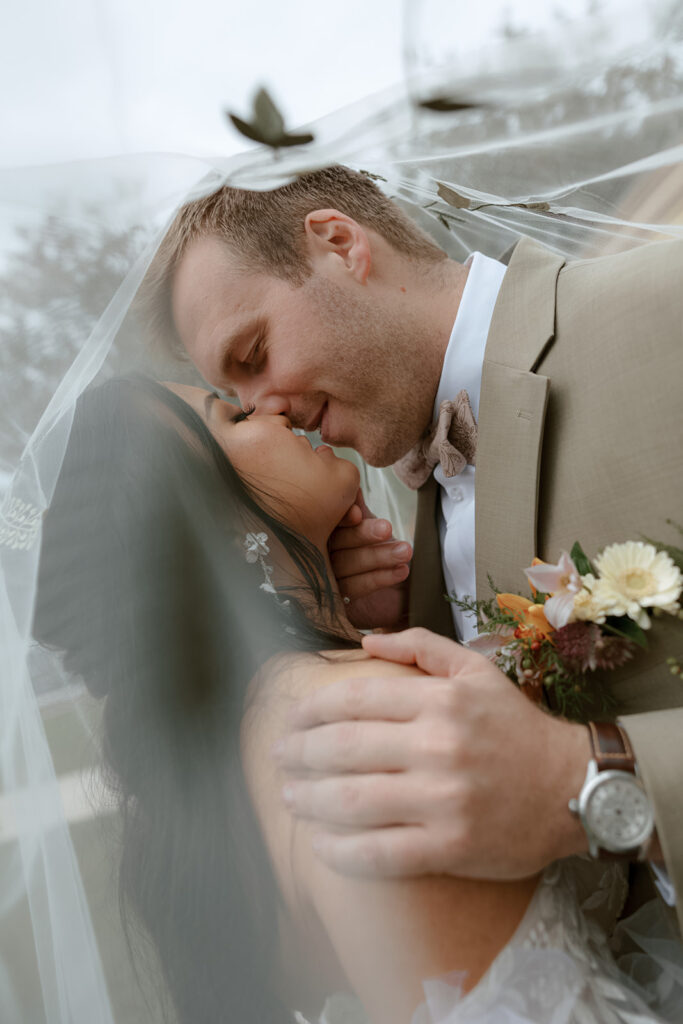 Bride and groom takes portraits for their Bryan Museum garden wedding