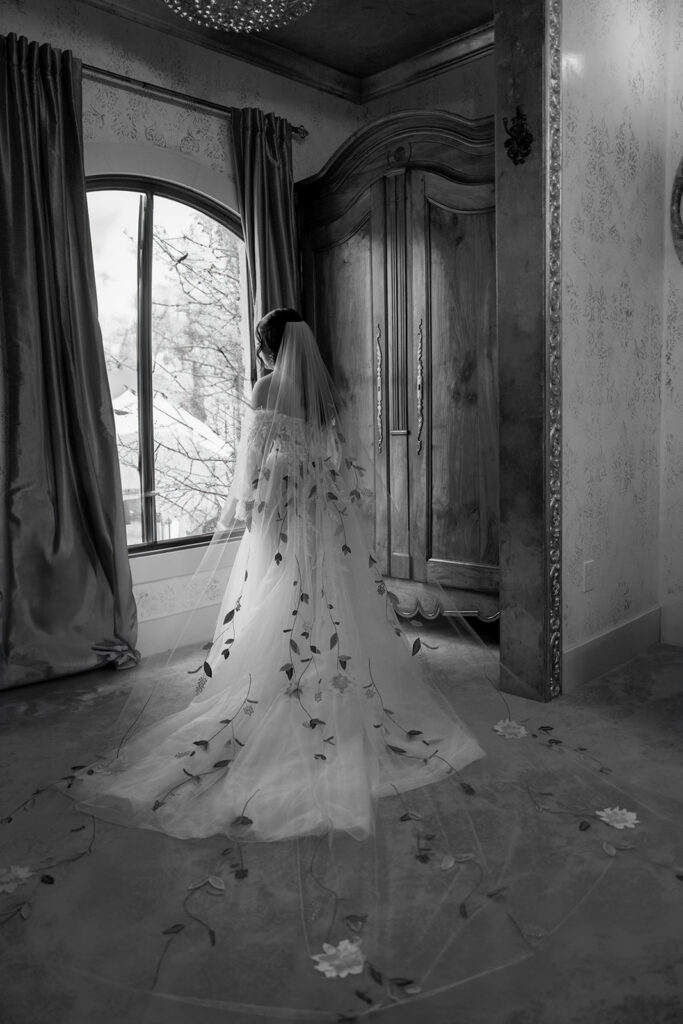 Black and white photo of bride before her Bryan Museum garden wedding.
