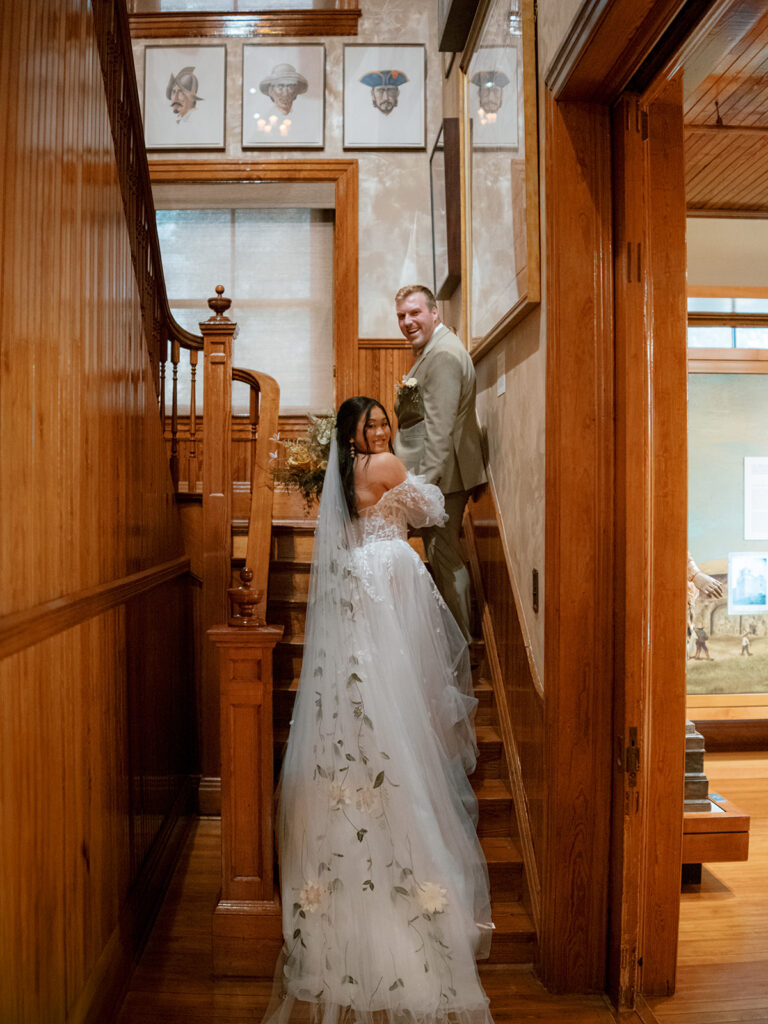 Bride and groom takes portraits for their Bryan Museum garden wedding