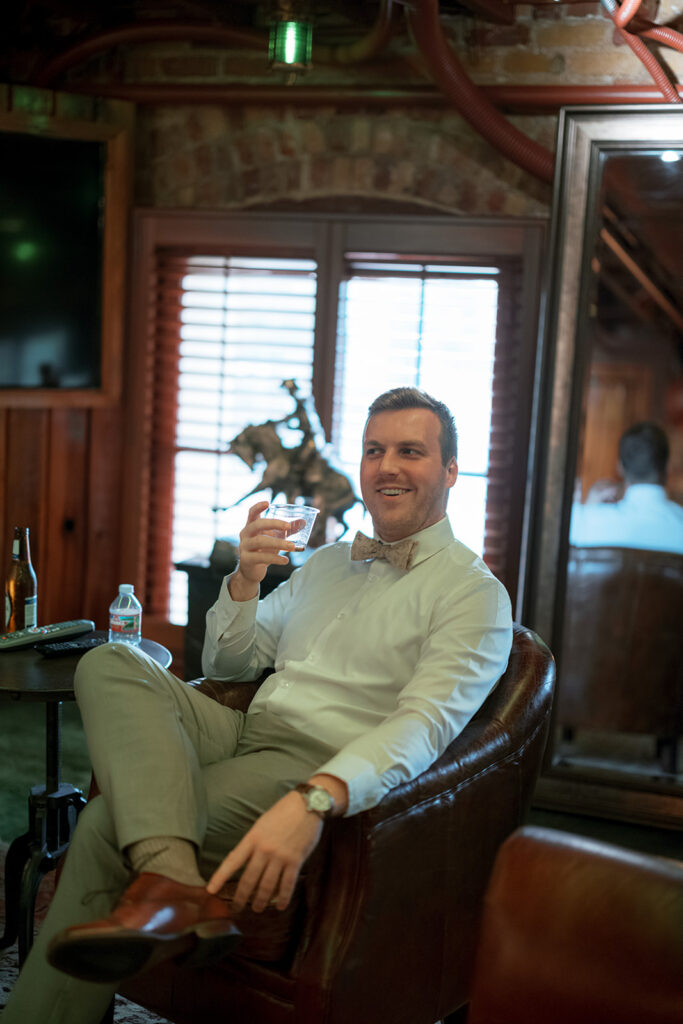 Groom makes a toast for his Bryan Museum garden wedding.