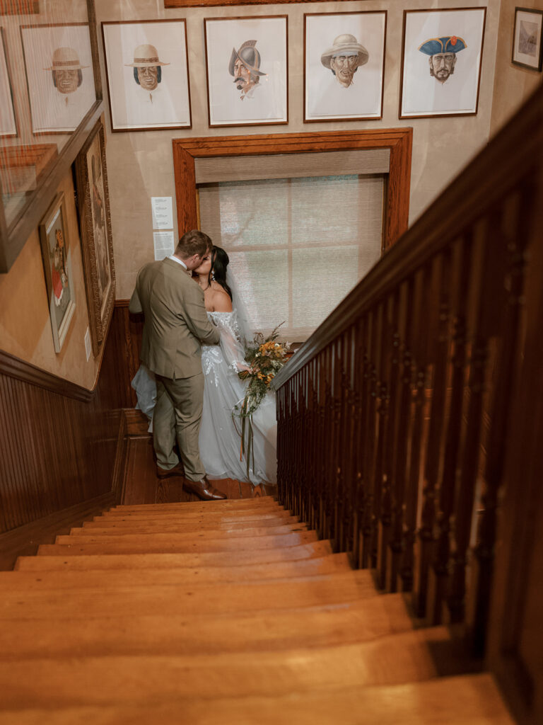 Bride and groom takes portraits for their Bryan Museum garden wedding