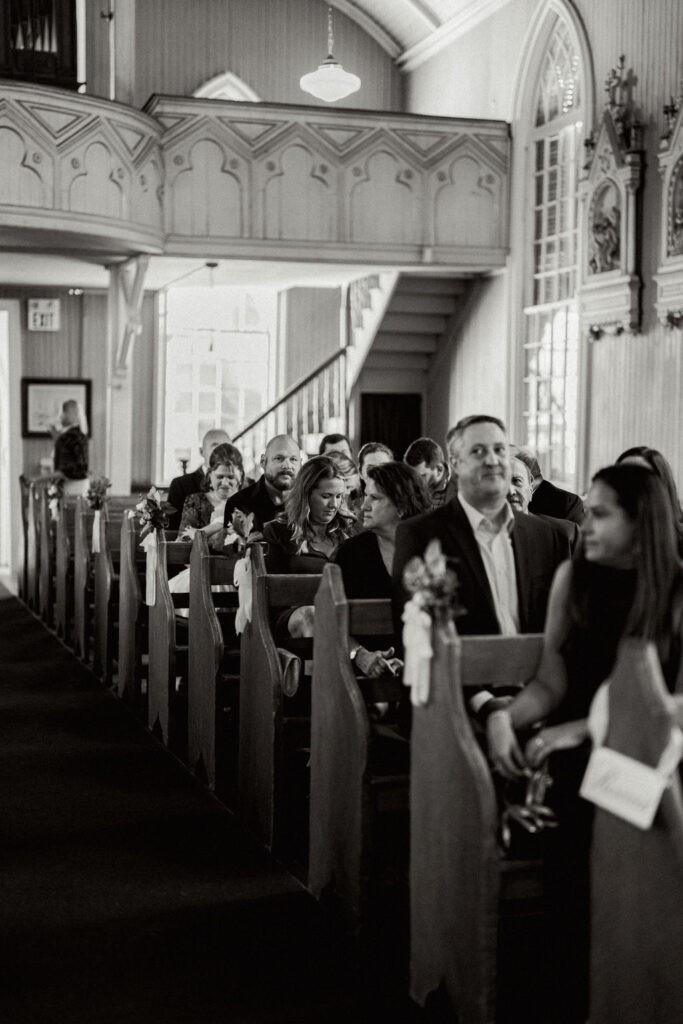 Guests during ceremony for their Real Wedding at Galveston City National Bank Museum