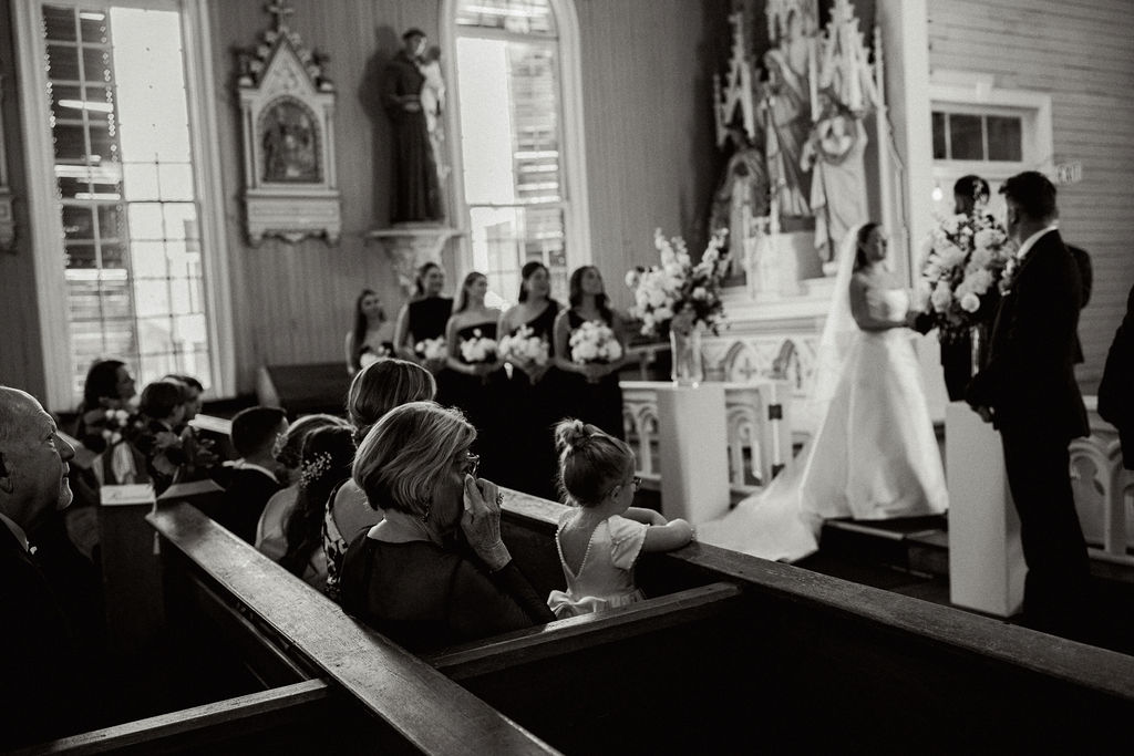 A teary eyed moment from the family for their real Wedding at Galveston City National Bank Museum