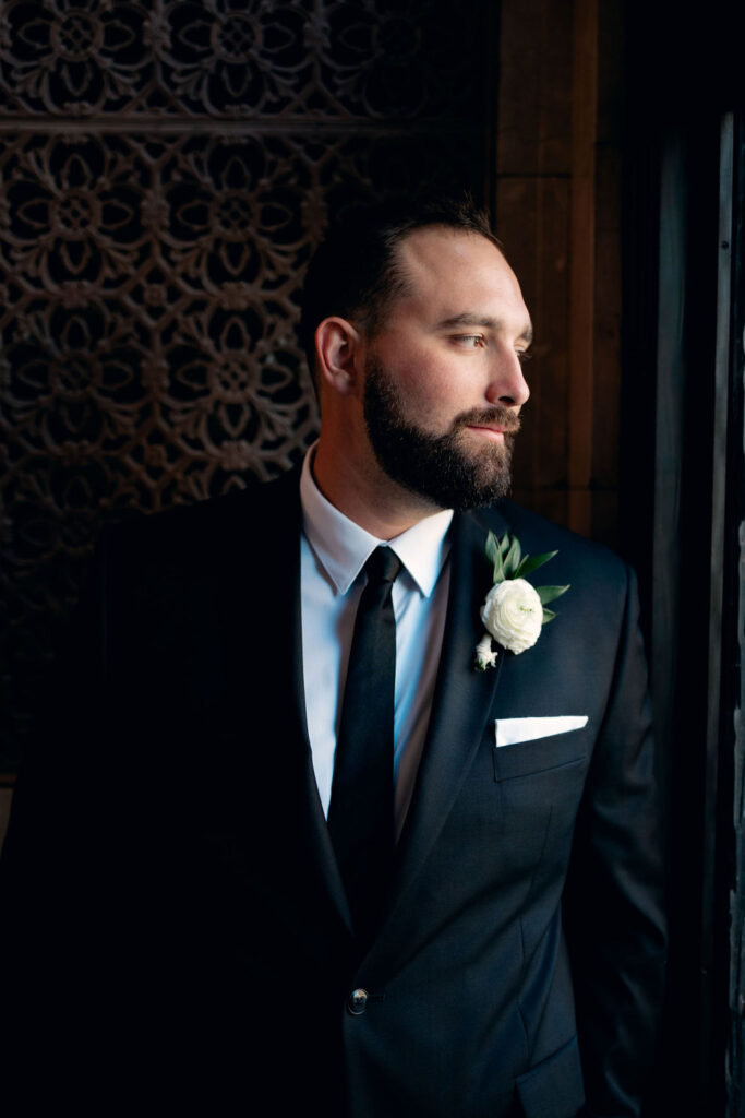 Groom poses before his Real Wedding at Galveston City National Bank Museum