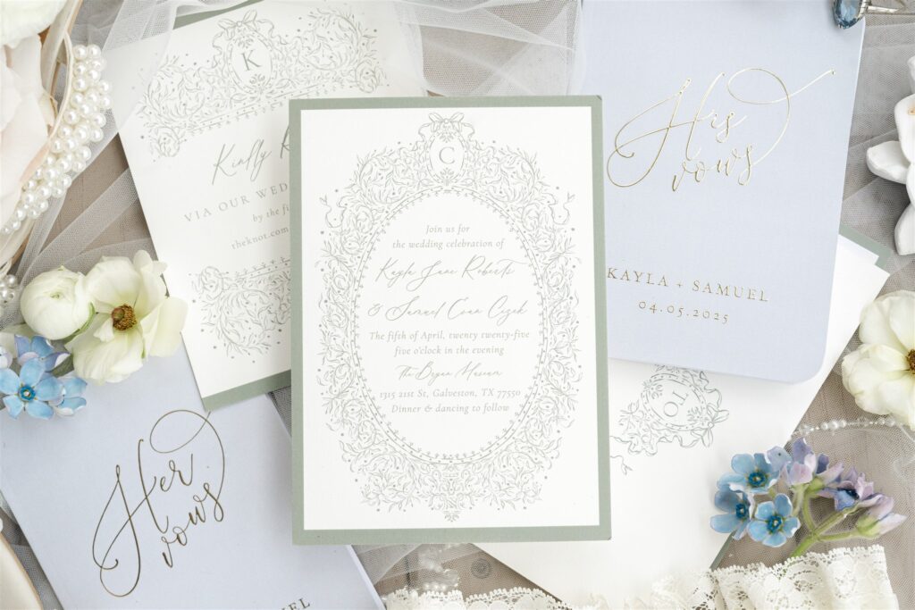 Wedding invitation suite styled with delicate pastel flowers for a romantic Bryan Museum wedding.