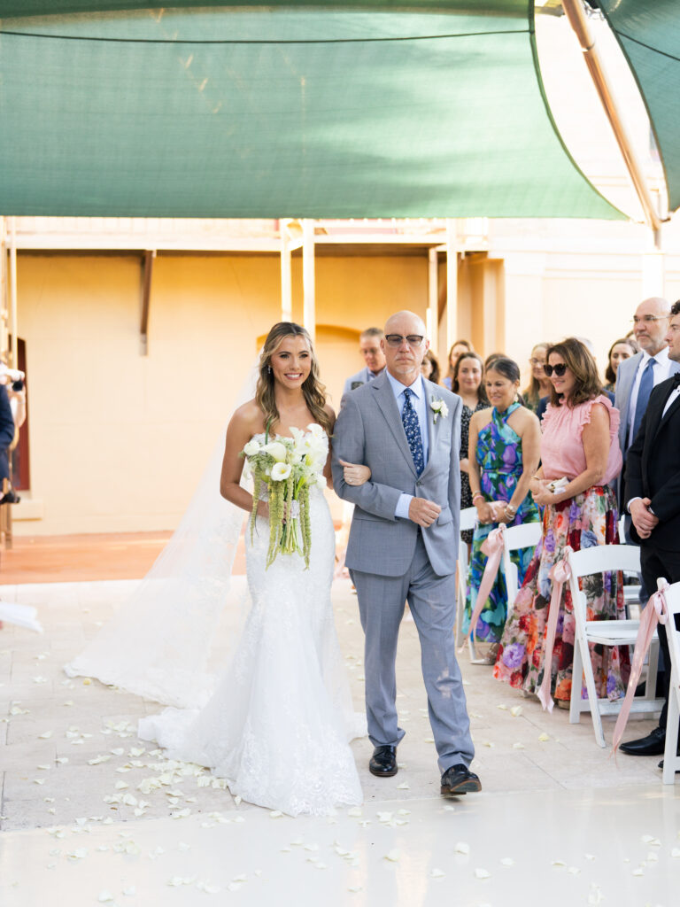 Wedding chair decor  during ceremony at a romantic fall wedding at The Bryan Museum.