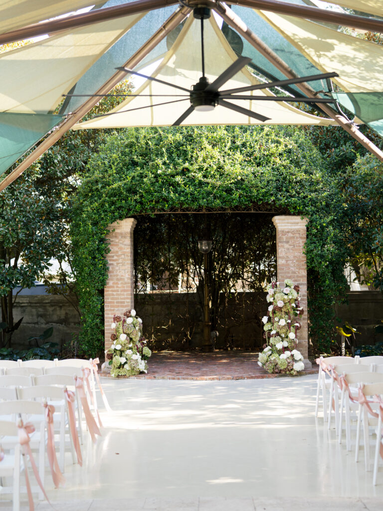 Wedding ceremony decor during romantic fall wedding at The Bryan Museum.