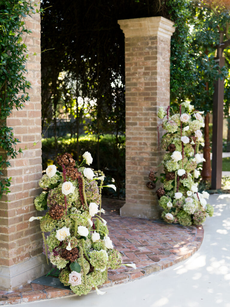 Wedding floral decor during romantic fall wedding at The Bryan Museum.