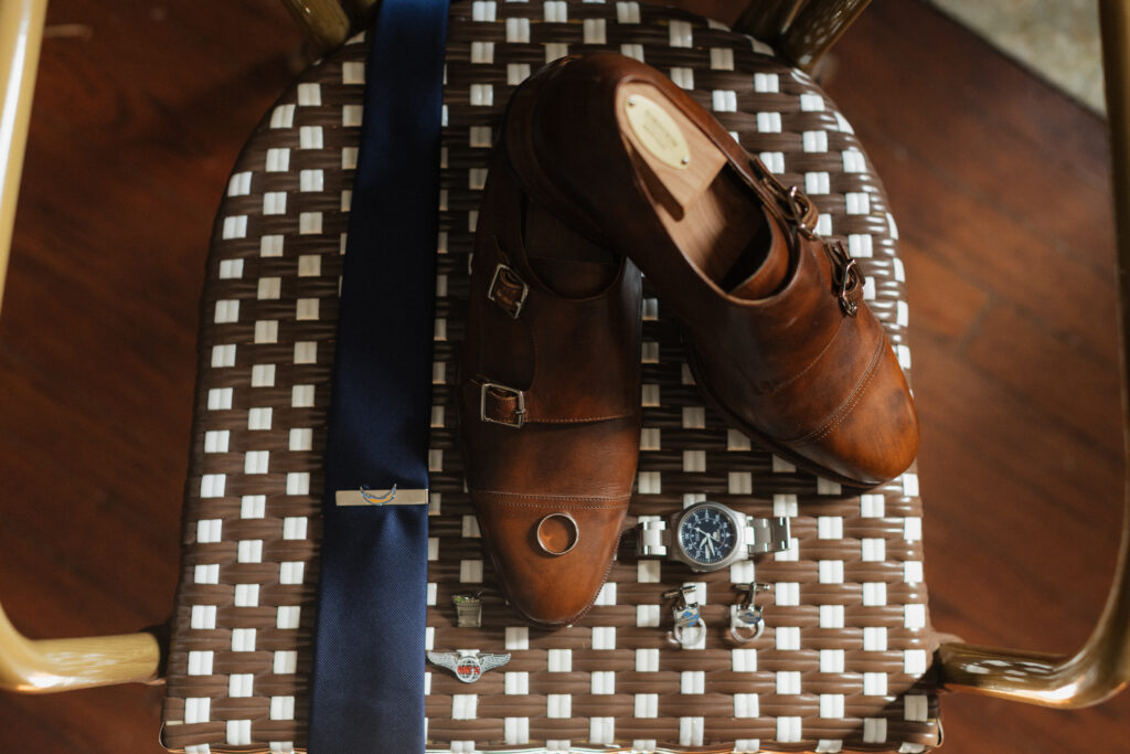Groom details including leather shoes and watch photographed at Carr Mansion wedding.